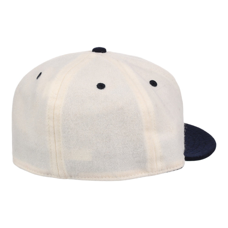 The Ebbets Field Flannels New York Rens Wool Ballcap features a dark navy brim, white panels with black stitching, vintage-inspired seams, and a round top button, shown from the back.
