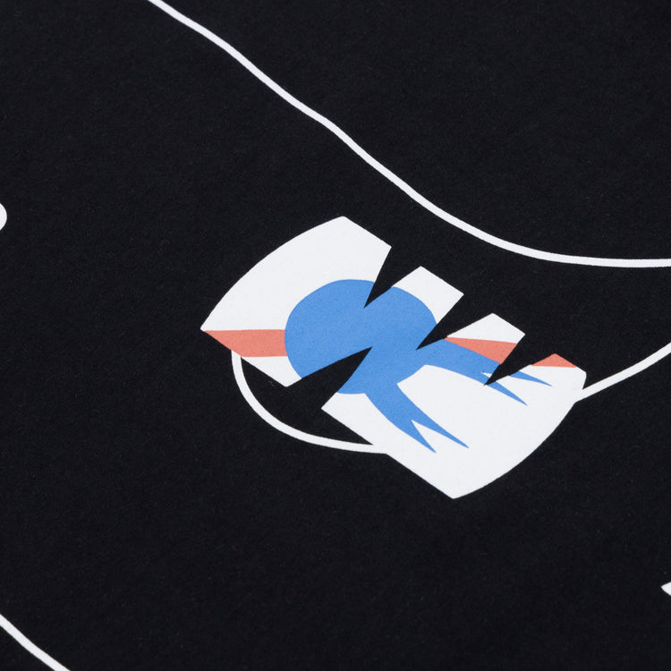 A close-up of the PBR EFF Vintage Beer T-Shirt - Ghost by Ebbets Field Flannels: a graphic design on black fabric with a fragmented white rectangle, blue bird, and red accents—evoking classic Pabst Blue Ribbon style. Thin white lines complete the look.
