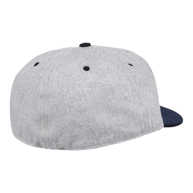 An officially licensed EFF University of Nevada Wolf Pack Mascot Collegiate Wool Ballcap with a gray crown, dark blue brim and button, back and side view, features ventilation eyelets on top—perfect for vintage fans.