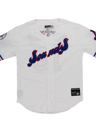 The Nashville Sounds EFF MiLB Button Down Jersey by EFF features a white vintage look with “Sounds” in blue and red script, red and blue striped sleeves, and a team patch—classic style from the Ebbets Vintage Collection.