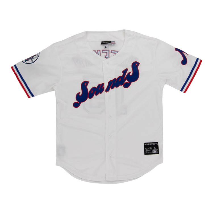 The Nashville Sounds EFF MiLB Button Down Jersey by EFF features a white vintage look with “Sounds” in blue and red script, red and blue striped sleeves, and a team patch—classic style from the Ebbets Vintage Collection.