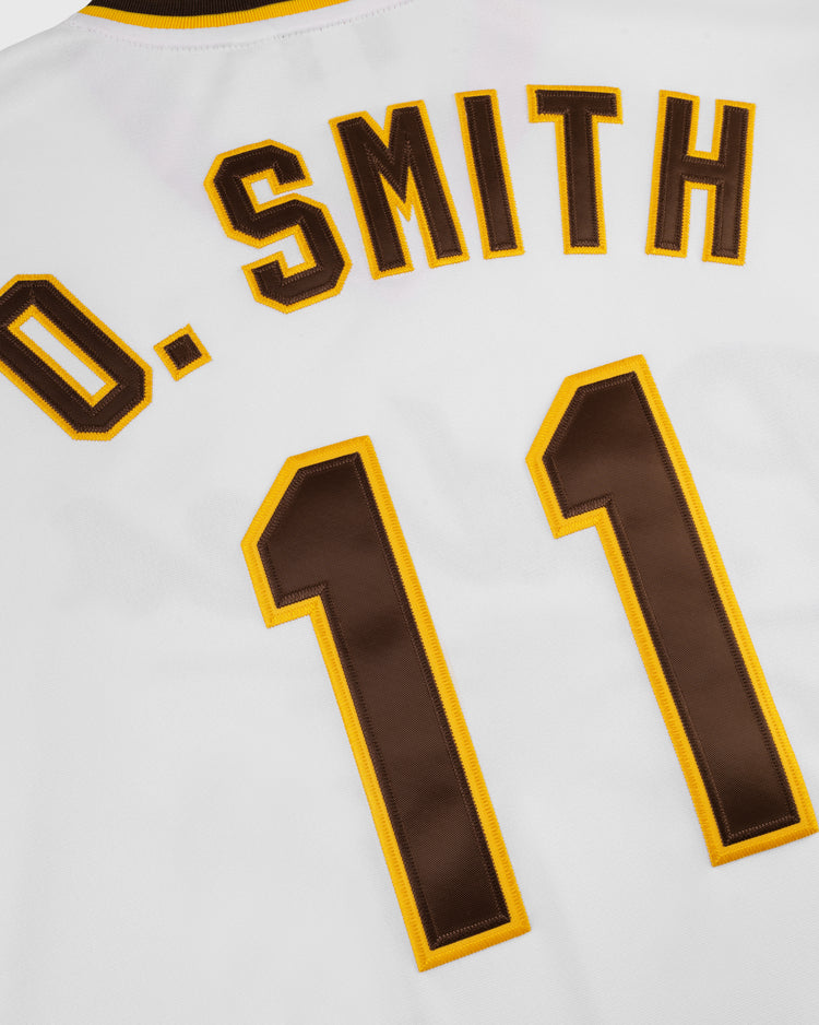 The EFF Walla Walla Padres Mesh V-Neck Jersey is a white sports jersey with O. SMITH in yellow and brown above the number 11, honoring Ozzie Smiths San Diego Padres era.