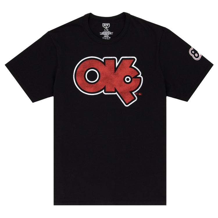 The Ebbets Field Flannels Oklahoma City 89ers EFF MiLB Vintage T-Shirt is a black premium cotton tee with a bold red and white “OK” logo on the chest and a #8 patch on the left sleeve, inspired by classic Minor League styles.