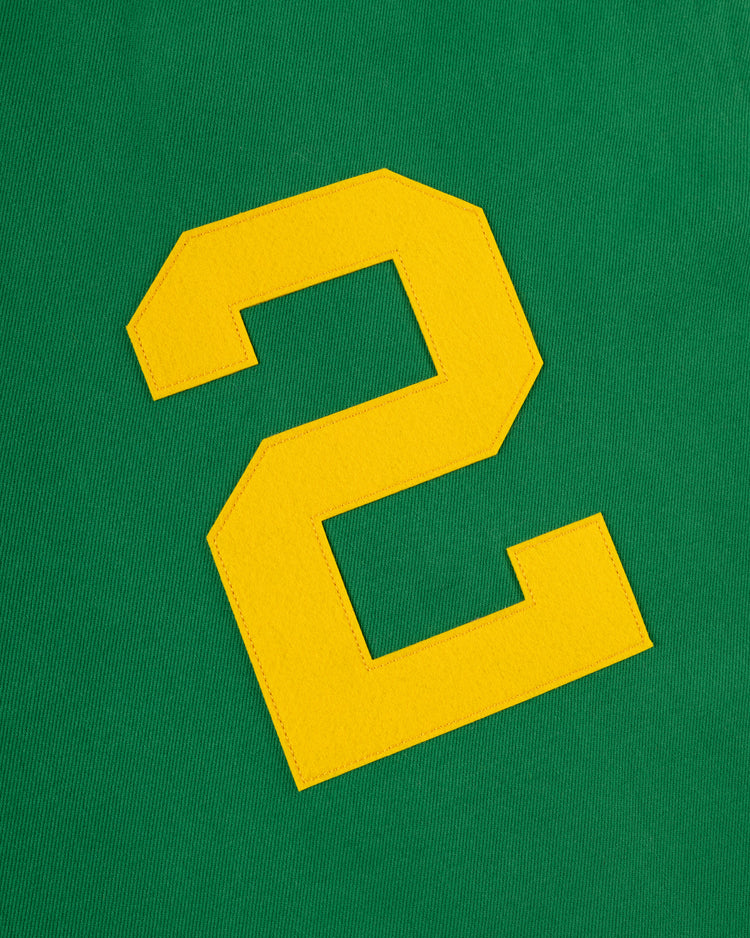 The Ebbets Field Hawaii Islanders (PCL) Cotton Twill Baseball Jersey features a bold yellow number 2 stitched on green cotton twill, inspired by the classic Pacific Coast League teams style.
