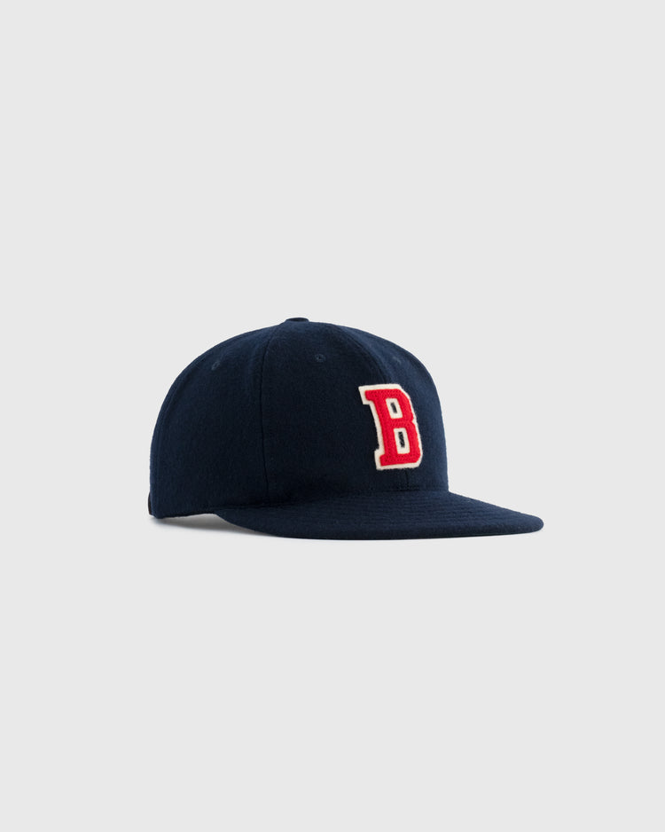 The EFF Birmingham Barons 1932 Authentic Wool Ballcap features a navy blue design with a red and white B on the front, shown against a light gray background—ideal for vintage baseball hat enthusiasts.