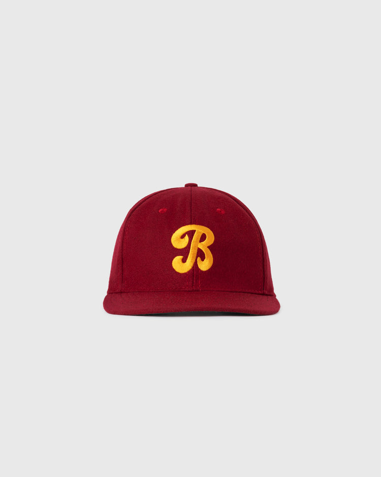 The EFF Brooklyn College 1947 Authentic Wool Ballcap is a vintage maroon cap with a yellow embroidered B on the front, shown against a plain light gray background.
