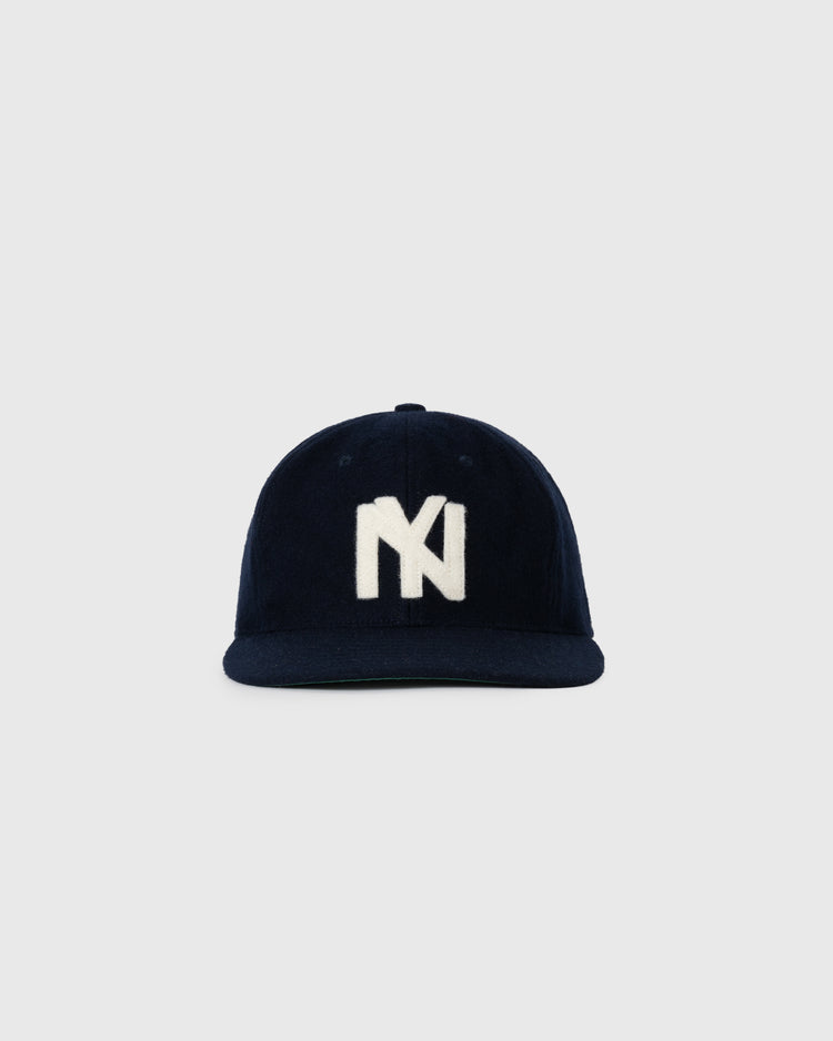 The EFF Brooklyn Eagles 1935 Authentic Wool Ballcap is a dark blue vintage baseball hat with a flat brim and a bold white 1935 NY logo, shown against a plain light gray background.