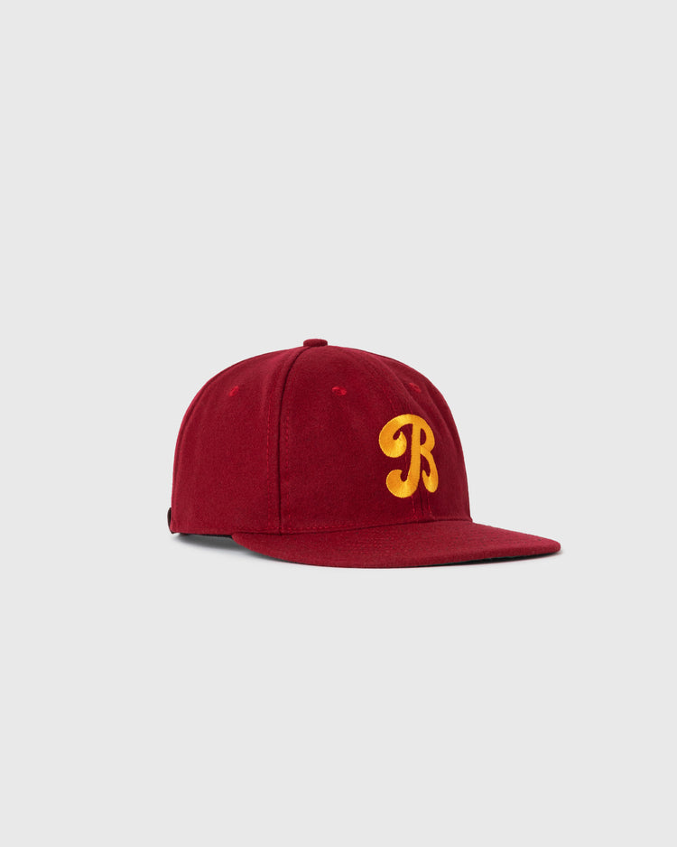 The EFF Brooklyn College 1947 Authentic Wool Ballcap features maroon wool with a yellow B on the front, styled after the vintage original, shown against a light gray background.