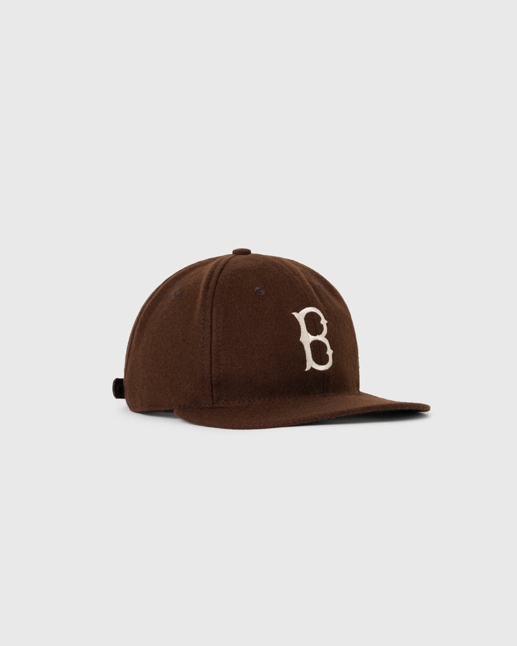 The EFF Brown University 1959 Authentic Wool Ballcap features a brown wool design, curved brim, and a white embroidered B on the front, inspired by the Bears 1959 cap, shown on a plain light background.