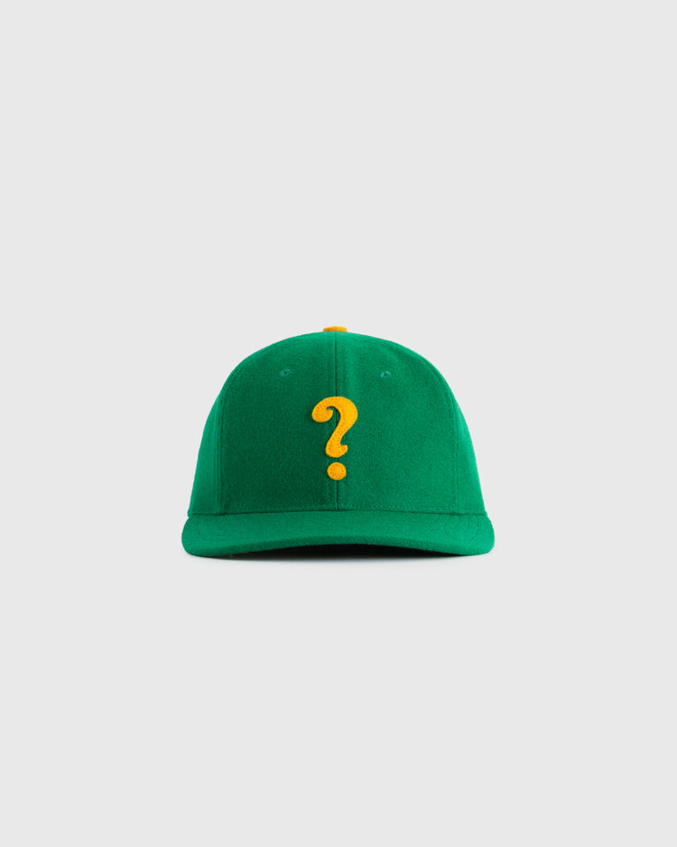 The EFF Clearing Question Marks 1941 Authentic Wool Ballcap is shown in green wool with a yellow question mark embroidered on the front, set against a light gray background—a faithful reproduction of the 1941 classic.