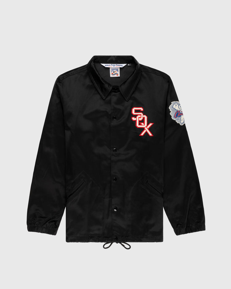 The EFF Chicago White Sox 1959 Satin Windbreaker Jacket features a black button-up design, red and white SOX chest logo, colorful embroidered sleeve patch, collar, front pockets, drawstring hem, and satin finish—a standout vintage MLB style.