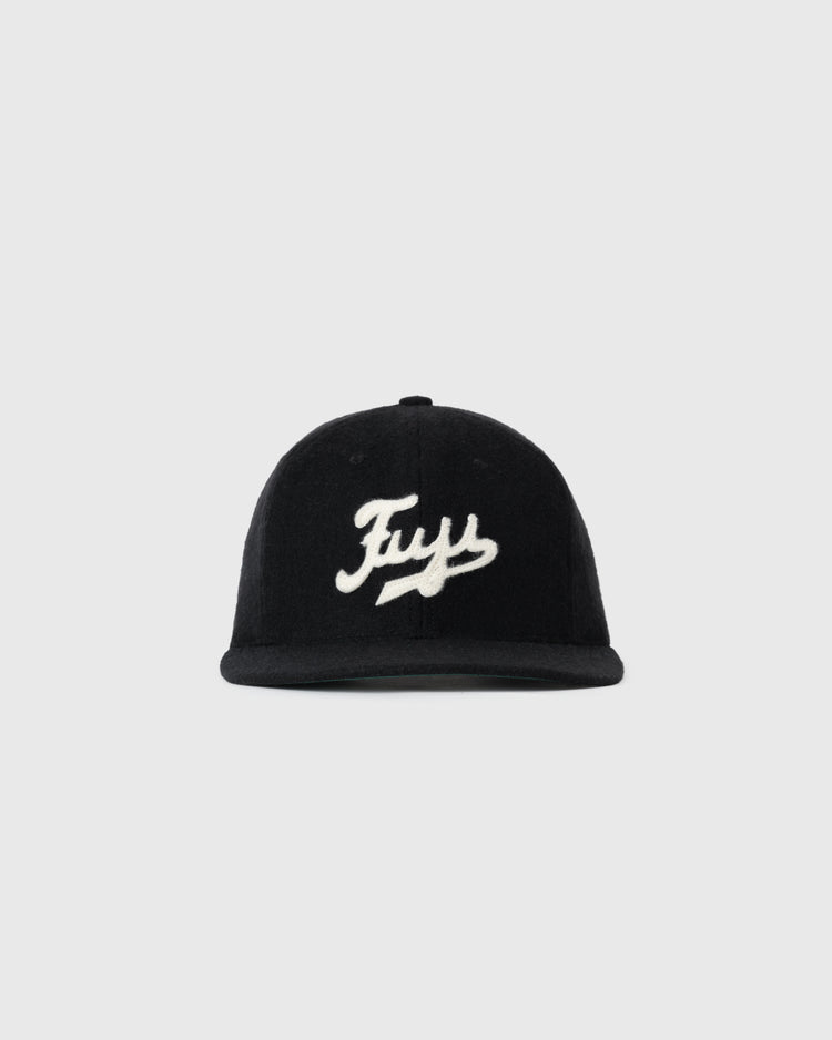The Fuji Athletic Club 1931 Authentic Wool Ballcap by EFF features black genuine wool and a white cursive Fuy logo on the front, paying homage to Japanese-American baseball history. Displayed on a plain light gray background.