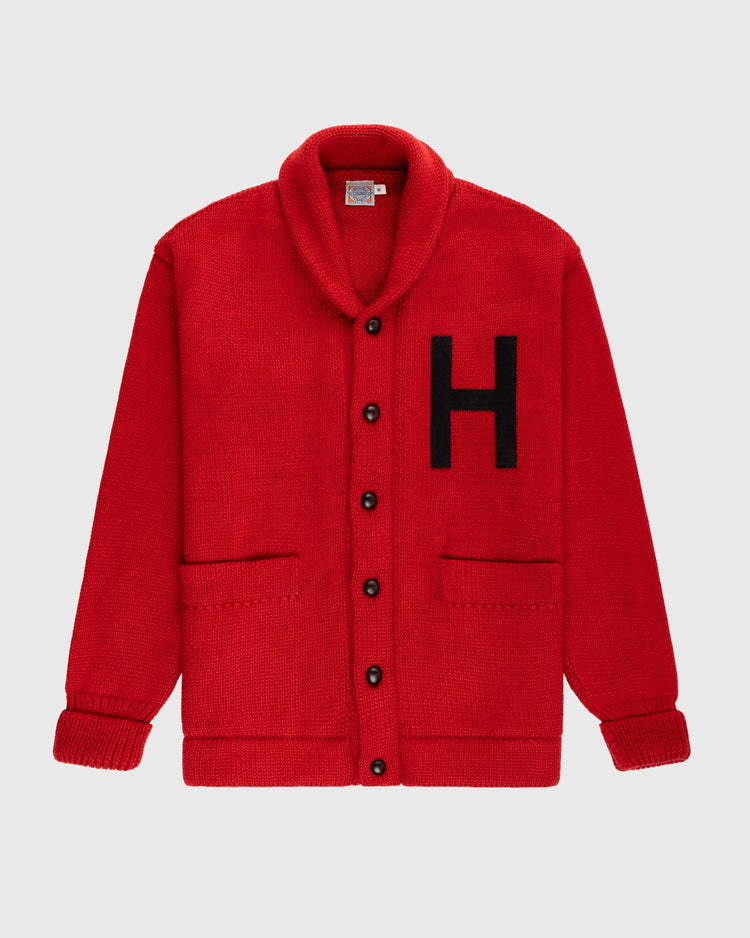 The EFF Harvard University 1940 Wool Shawl Collar Sweater features bright red wool, black buttons, front pockets, ribbed cuffs, a shawl collar, and a bold black H on the chest—a true vintage classic.