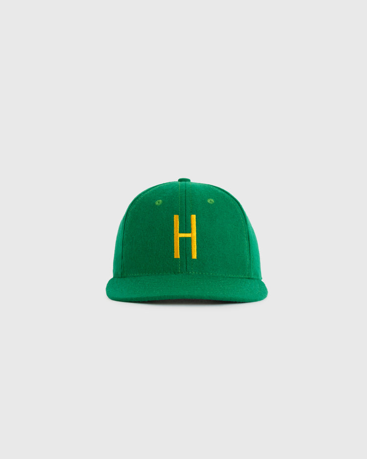 The EFF Hawaii Islanders 1961 Authentic Wool Ballcap features green wool and a yellow embroidered H, displayed on a plain light gray background.