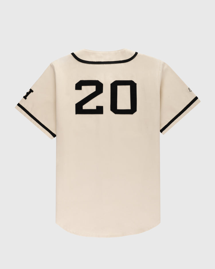 The Homestead Grays Cotton Twill Baseball Jersey by Ebbets Field Flannels features a cream color with black sleeve and collar trim, large black number 20 on the back, honoring Negro Leagues legend Josh Gibson.