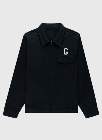 The Ebbets Field Flannels Homestead Grays Cotton Grounds Crew Jacket features black cotton twill, a front zipper, buttoned chest pocket, and a white G patch on the left chest, set against a plain light gray background.