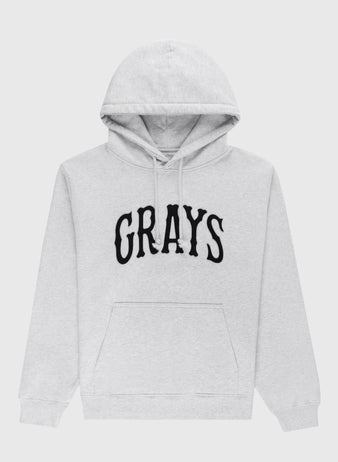 The Ebbets Field Flannels Homestead Grays Heavyweight Cotton Terry Pullover Hoodie features light gray fabric, a front pocket, and bold black GRAYS lettering—honoring the legendary team and Negro Leagues Baseball Museum history.
