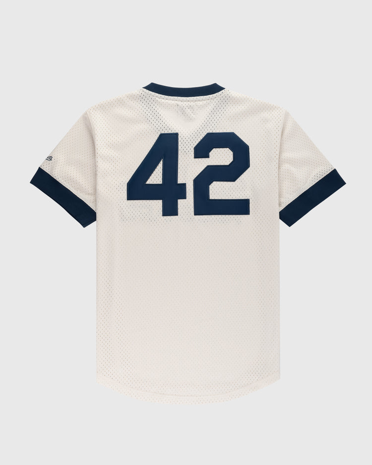 The Ebbets Field Jackie Robinson Mesh V-Neck Jersey features white mesh with navy trim and a bold navy 42 on the back—a classic tribute to baseball legend Jackie Robinson.