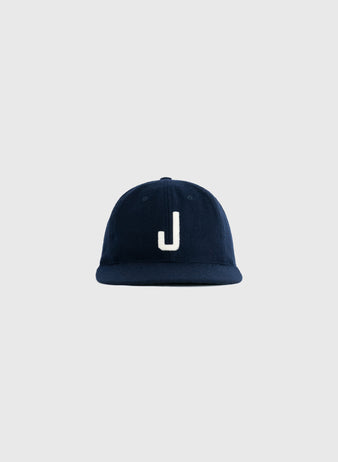 The EFF Joplin Miners 1950 Authentic Wool Ballcap, in navy with a white uppercase J on the front, is inspired by the style worn by Mickey Mantle and shown against a plain light gray background.