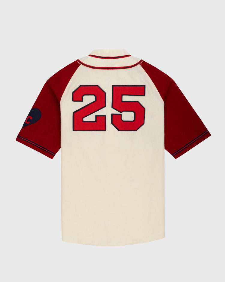 The Ebbets Field Kansas City Monarchs 1942 Authentic Wool Home Baseball Jersey features a cream body, red raglan sleeves, navy trim, and bold number 25, plus a left-sleeve patch with a red C honoring Negro Leagues Baseball.