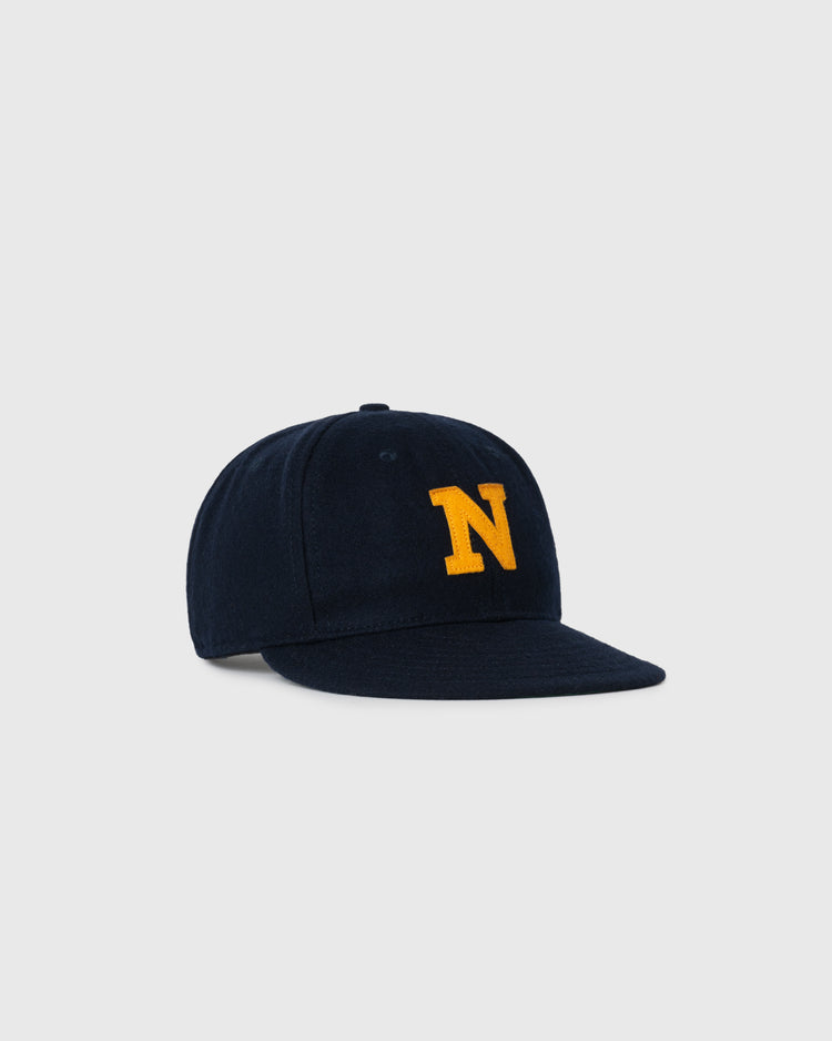 The EFF Navy 1928 Authentic Wool Ballcap features a navy blue design with a yellow N embroidered on the front, shown on a light gray background.
