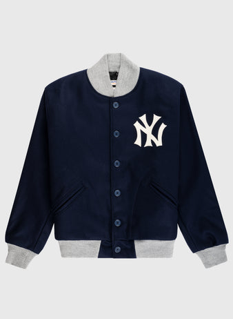 The EFF New York Yankees 1936 Authentic All Wool Varsity Jacket features a navy design with gray ribbed trim, blue center buttons, and a bold white NY logo on the chest, inspired by the classic 1936 on-field style.