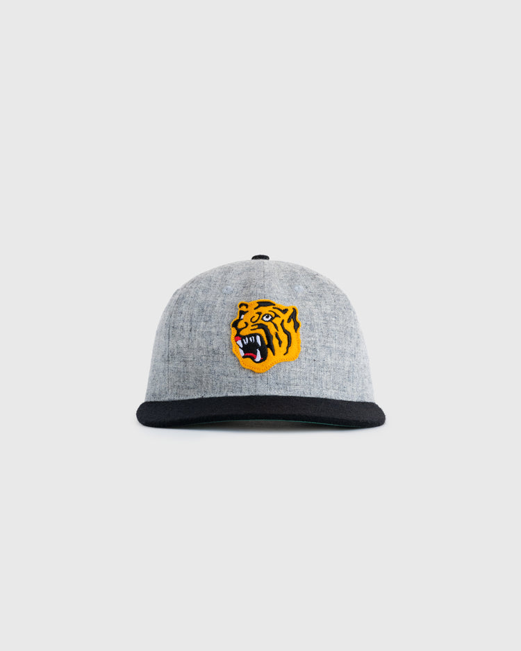 The EFF Osaka Tigers 1940 Authentic Wool Ballcap is gray with a black brim and has a yellow and black roaring tiger patch on the front, shown against a white background.