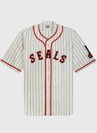 The Ebbets Field San Francisco Seals 1938 Authentic Wool Home Baseball Jersey features a vintage white design with black pinstripes, red trim, and bold red SEALS lettering, faithfully reproducing the classic 1938 original.
