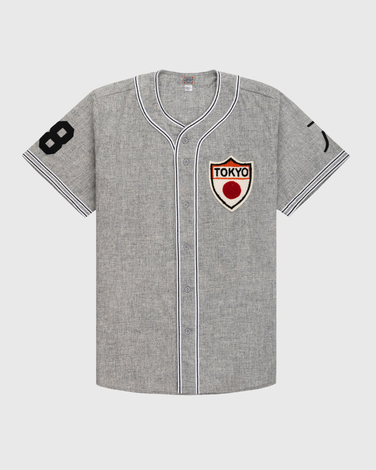 The Ebbets Field Flannels Tokyo Kyojin (Giants) 1936 Authentic Wool Road Baseball Jersey features gray flannel, white and black striped trim, a black number 8 right sleeve, left sleeve mark, and a Tokyo patch with red circle.
