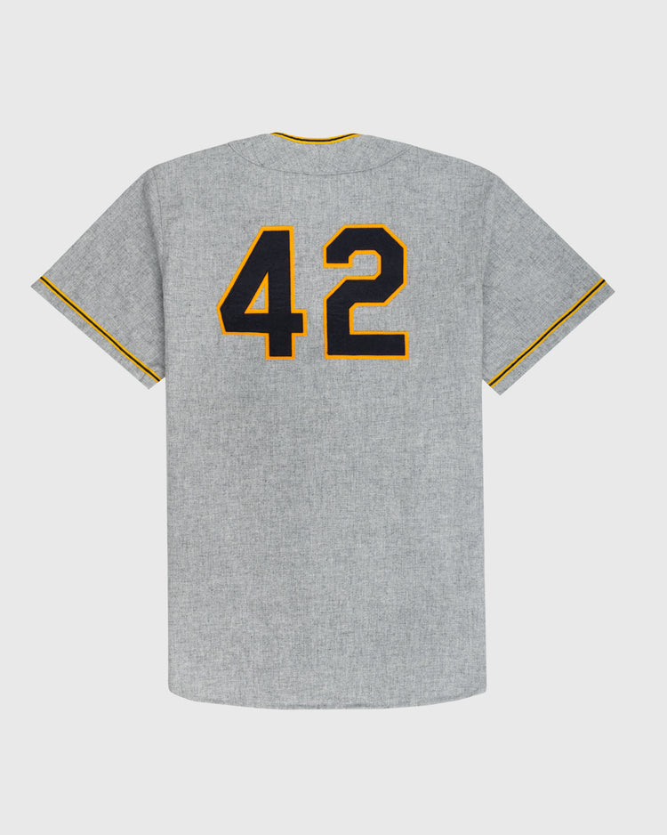 The Ebbets Field University of Notre Dame 1956 Authentic Wool Road Baseball Jersey features a gray design with large black and yellow outlined number 42 on the back and short sleeves trimmed with thin yellow and black stripes.