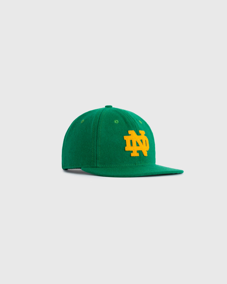The EFF University of Notre Dame ND Authentic Wool Ballcap features a green wool design with a yellow ND logo on the front, shown against a white background—ideal for fans wanting a classic replica hat.