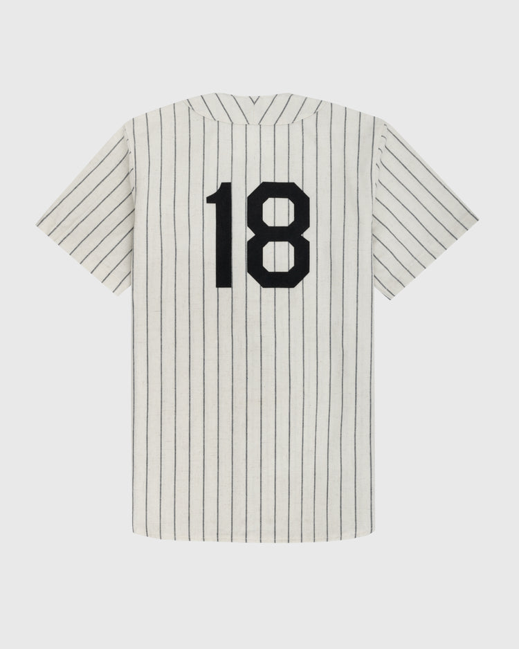 The Ebbets Field Flannels Homestead Grays 1944 Authentic Wool Home Baseball Jersey is a white, short-sleeved jersey with thin black pinstripes, inspired by the Negro Leagues Baseball Museum, and features the number 18 in bold black on the back.