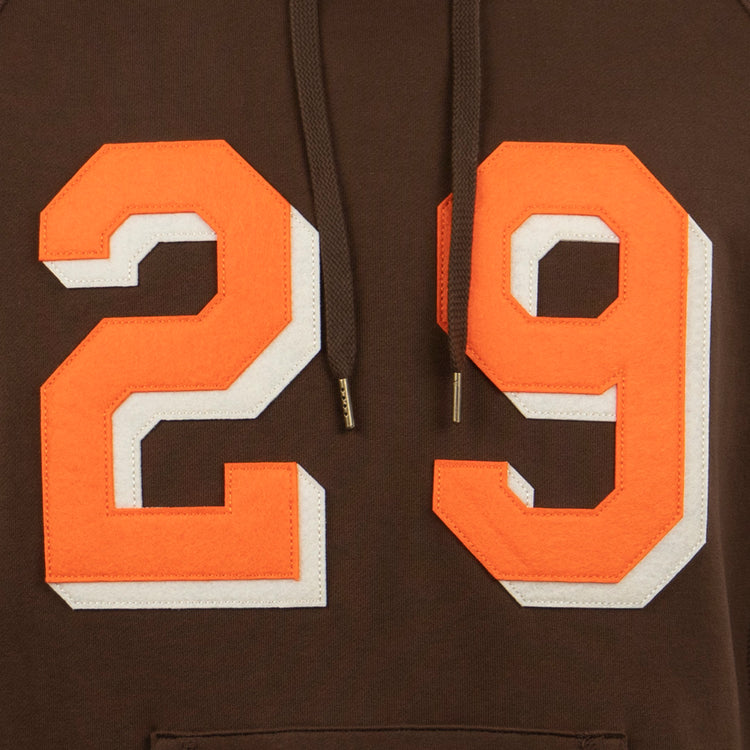 Close-up of the EFF Satchel Paige French Terry Script Hooded Sweatshirt, a brown hoodie with bold orange and white 29 on the front, honoring Satchel Paige’s Negro Leagues legacy and major league debut.