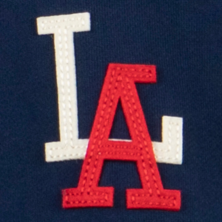 The EFF Los Angeles (PCL) French Terry Script Hooded Sweatshirt features white and red overlapping L and A letters with visible stitching on dark blue fabric, honoring the Angels’ 1942 PCL playoff legacy.