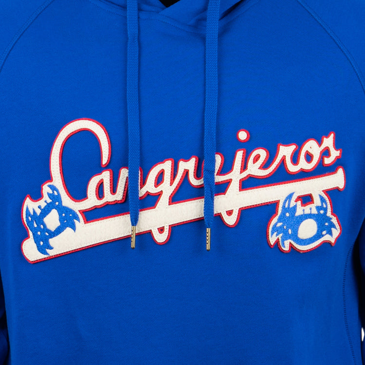 The EFF Santurce Cangrejeros French Terry Script Hooded Sweatshirt in royal blue features Cangrejeros in white and red script across a baseball bat with two crab logos, honoring the Puerto Rican League spirit.