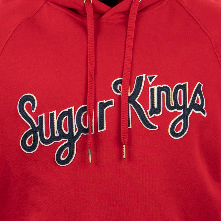 The EFF Havana Sugar Kings French Terry Script Hooded Sweatshirt features “Sugar Kings” in white and black script on the front, inspired by Havana baseball heritage, with two red drawstrings finished in gold tips.