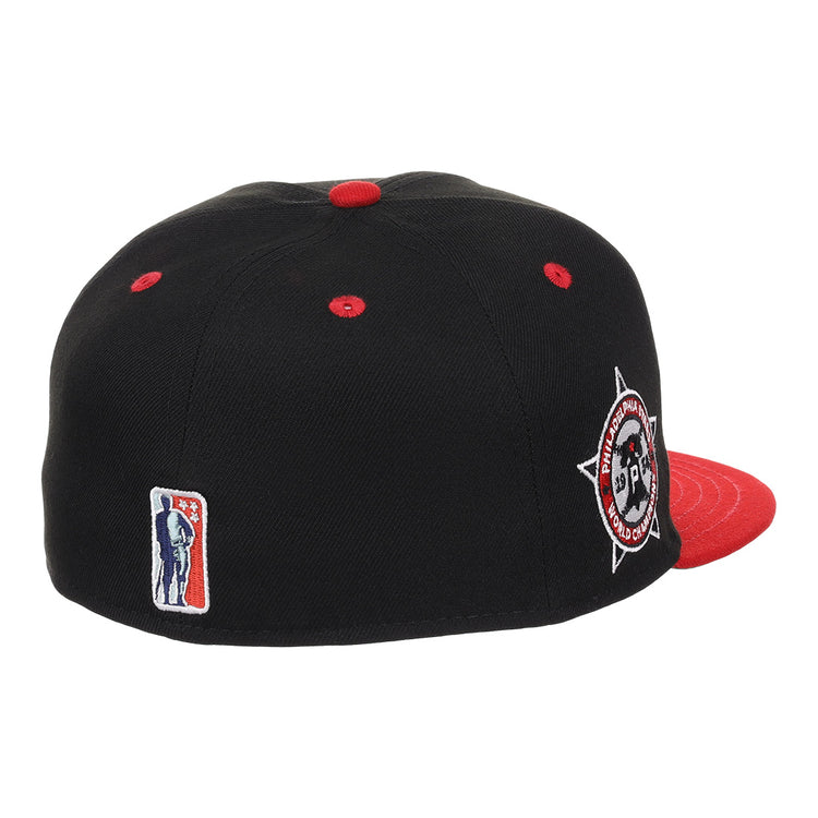 The EFF Philadelphia Stars NLB Flip Fitted Ballcap is black and red with a high crown, red brim, button, and eyelets. It features a circular embroidered side patch and a small Negro National League batter logo on the back.