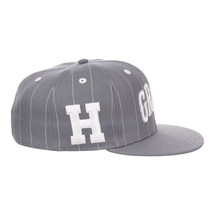 The EFF Homestead Grays NLB Black Pinstripe Fitted Ballcap features white pinstripes on gray, a bold white “H” logo, and a flat gray brim, honoring Negro National League heritage.