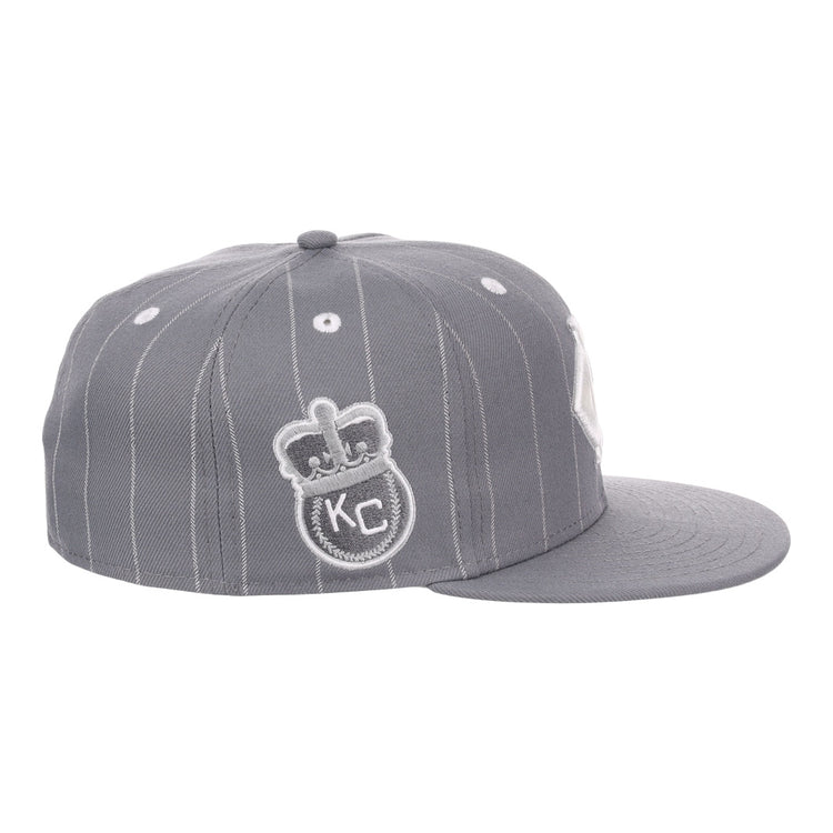 The EFF Kansas City Monarchs NLB Black Pinstripe Fitted Ballcap features gray pinstripes, a flat brim, and embroidered crown, KC, and Monarchs Baseball logos—honoring the Negro National League and classic vintage style.