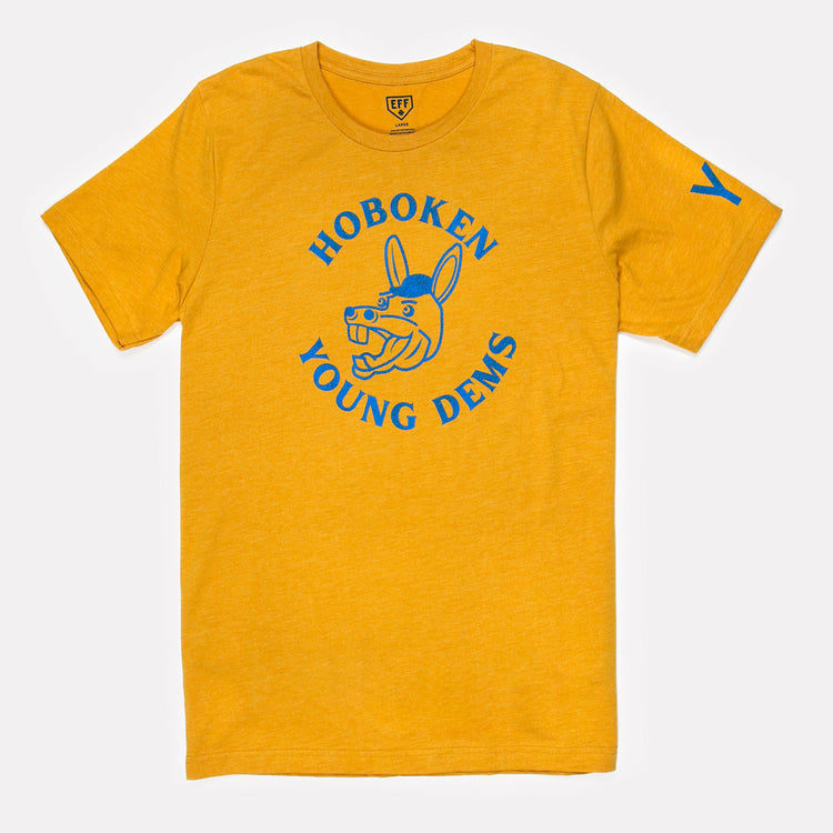 The Hoboken Young Democrats T-Shirt by Ebbets Field Flannels is a yellow unisex tee featuring blue “Hoboken Young Dems” text, a cartoon donkey head on the front, and a sporty blue “Y” on the left sleeve.
