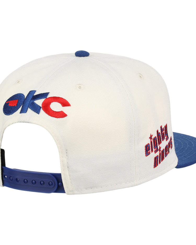 The Ebbets Field Oklahoma City 89Ers MiLB Logo Wordmark Snapback Ballcap features a white crown, blue brim and snap closure, 