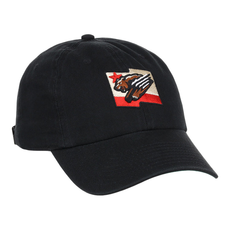 The Fresno Grizzlies MiLB Dad Ballcap by Ebbets Field is a black cap featuring a patch with a stylized bear, red star, and red stripe, inspired by the California state flag design.