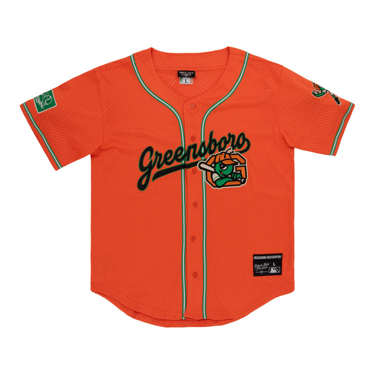 The Ebbets Field Greensboro Grasshoppers MiLB Button Down Jersey features bright orange fabric with green trim, 