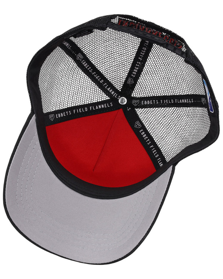 The Indianapolis Indians MiLB Trucker Ballcap by Ebbets Field features a red front panel, black mesh back, gray underbill, and inner black bands branded with EBBETS FIELD FLANNELS.