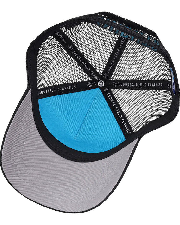 A look inside the Charlotte Knights MiLB Trucker Ballcap by Ebbets Field, featuring a black mesh design, gray brim, blue inner panel, and black support bands labeled EBBETS FIELD.