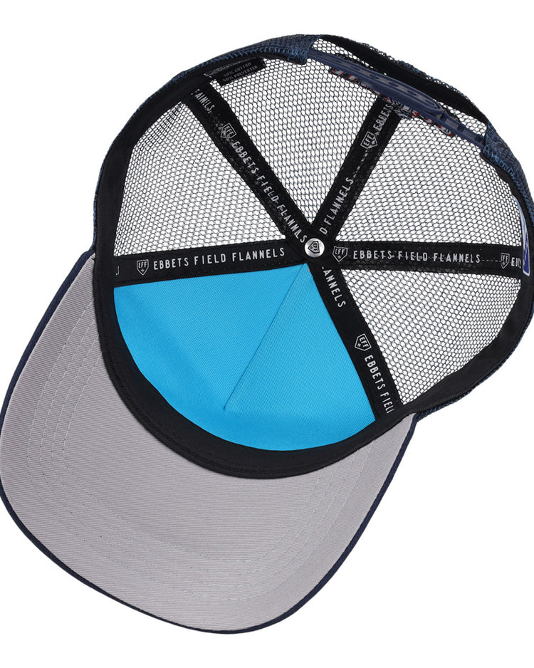 A view of the inside of an Amarillo Sod Poodles MiLB Trucker Ballcap by Ebbets Field, featuring black mesh panels, a light blue front panel, a wide gray brim, and black trim with white 