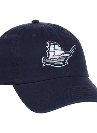 The Ebbets Field Columbus Clippers MiLB Dad Ballcap is a navy blue cap with an embroidered white sailing ship and red flags on the front panel.