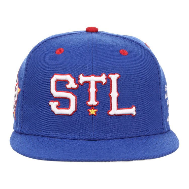 The Ebbets Field St. Louis Stars NLB Varsity Fitted Ballcap is a blue cap featuring bold white 