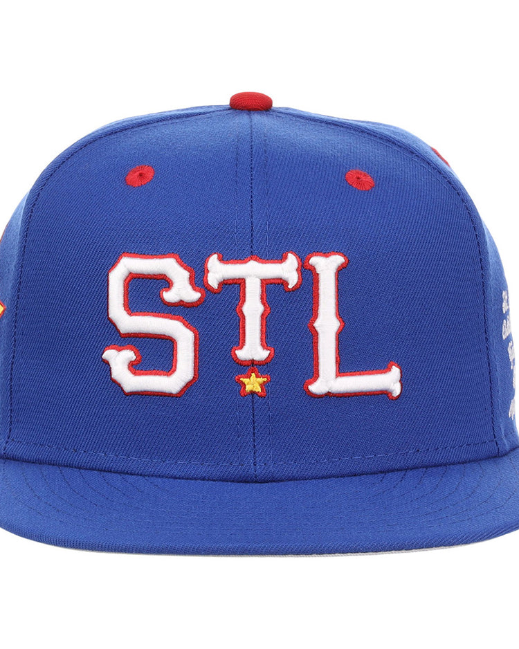 The Ebbets Field St. Louis Stars NLB Varsity Fitted Ballcap is a blue cap featuring bold white 