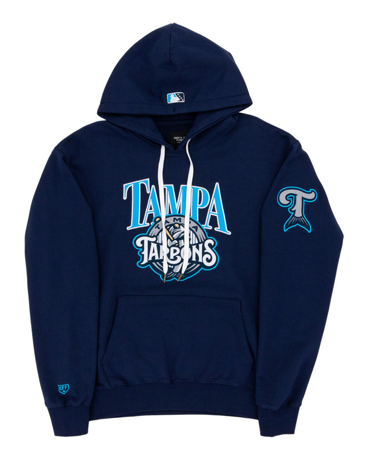 The Ebbets Field Tampa Tarpoons MiLB Cotton Hooded Sweatshirt features TAMPA TARPONS text and mascot logo on the chest, a fish tail logo on the left sleeve, a small logo on the right wrist, white drawstrings, and a front pocket.